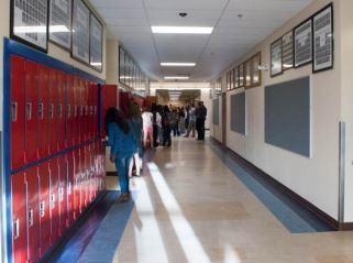 teachers and staff with colored outfits